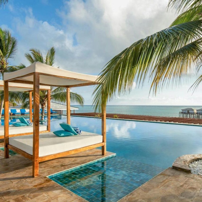 Le Mersenne özel plunge havuzu, palmiye ve turkuaz Hint Okyanusu, Michamvi Zanzibar