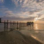Zanzibar Bay denize uzanan iskelesi ve gün batımı, Uroa